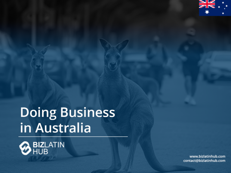 Two kangaroos stand on a blurred road with people in the background. The text reads "Doing Business in Australia" alongside the Biz Latin Hub logo and a note on investimento estrangeiro direto australiano. The Australian flag is in the top right corner, with contact information at the bottom right.