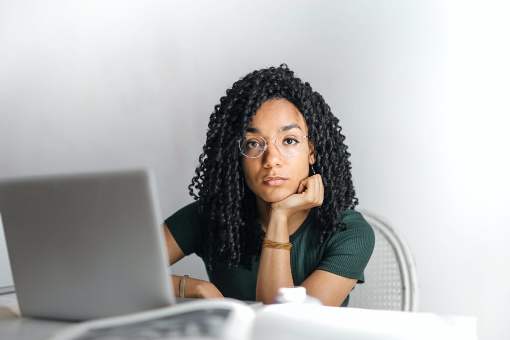 A stock photo of someone using a computer representing a tech worker to accompany an article on outsourcing in Bogota and hiring in Colombia.