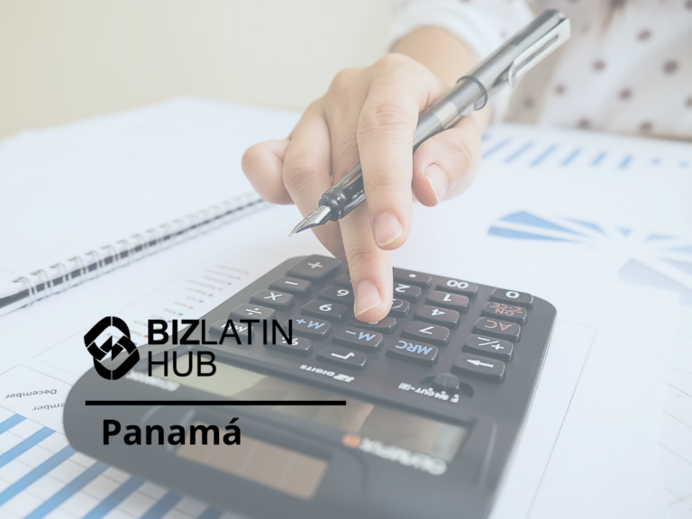 A person's hand pressing a button on a black calculator with a pen in hand. The background features a desk with various documents and charts related to impuestos locales en Panamá. The image includes the BizLatin Hub logo and the text "Panamá.