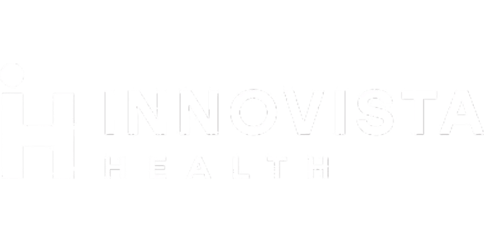 Logotipo da Innovista Health. O logotipo apresenta uma letra "i" estilizada à esquerda, com a palavra "Innovista" escrita em letras maiúsculas em negrito e "Health" em letras maiúsculas menores abaixo dela, tudo em branco sobre um fundo transparente. 