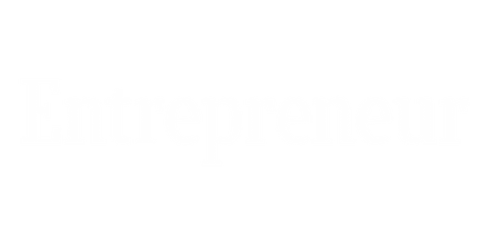 The image displays the word "Entrepreneur" written in a bold, white font against a transparent background, symbolizing success in fields like recruitment & PEO services. The text is centered and prominent.