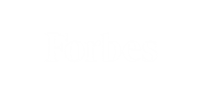 The image displays the logo of Forbes, featuring the text "Forbes" in a bold, serif font on a transparent background. The white text stands out prominently, embodying the prestige often linked to business and accounting excellence.